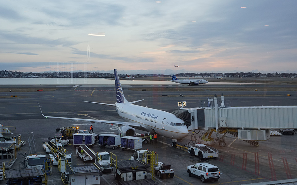 An Copa Airlines plane at a gate
